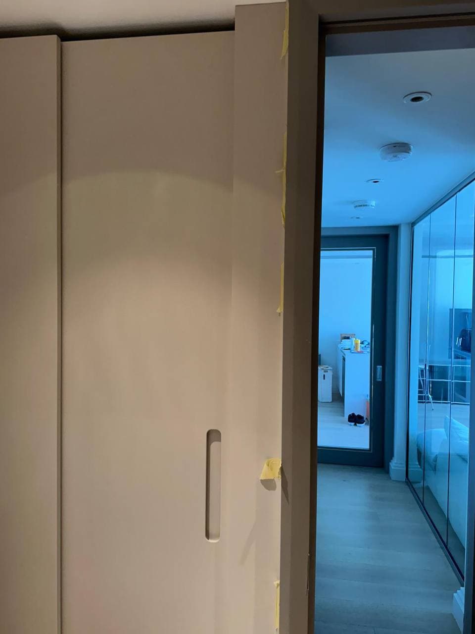 Finished bathroom cupboard detail tailored to the client's Belgravia apartment design requirements