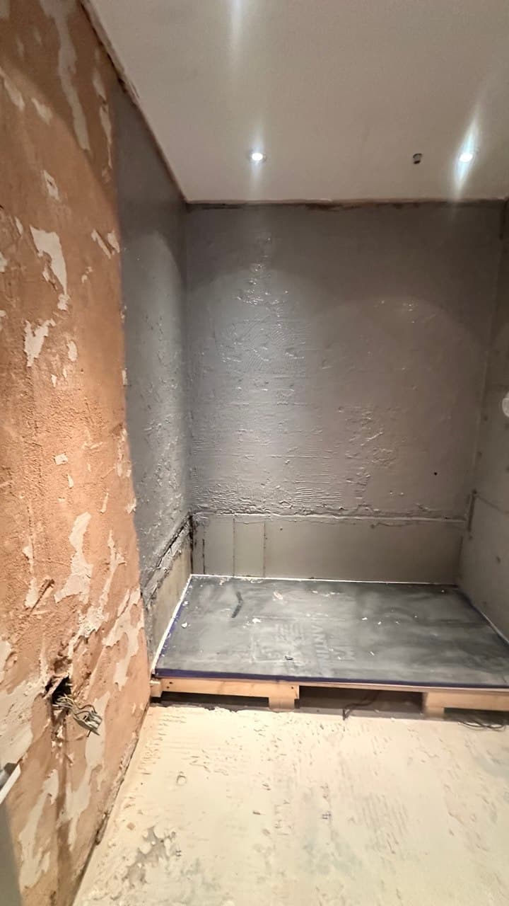 Waterproofing membrane applied in the shower enclosure
