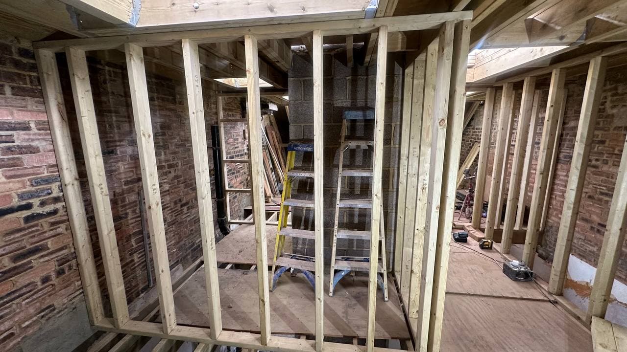 Internal timber partitions defining the revised residential layout