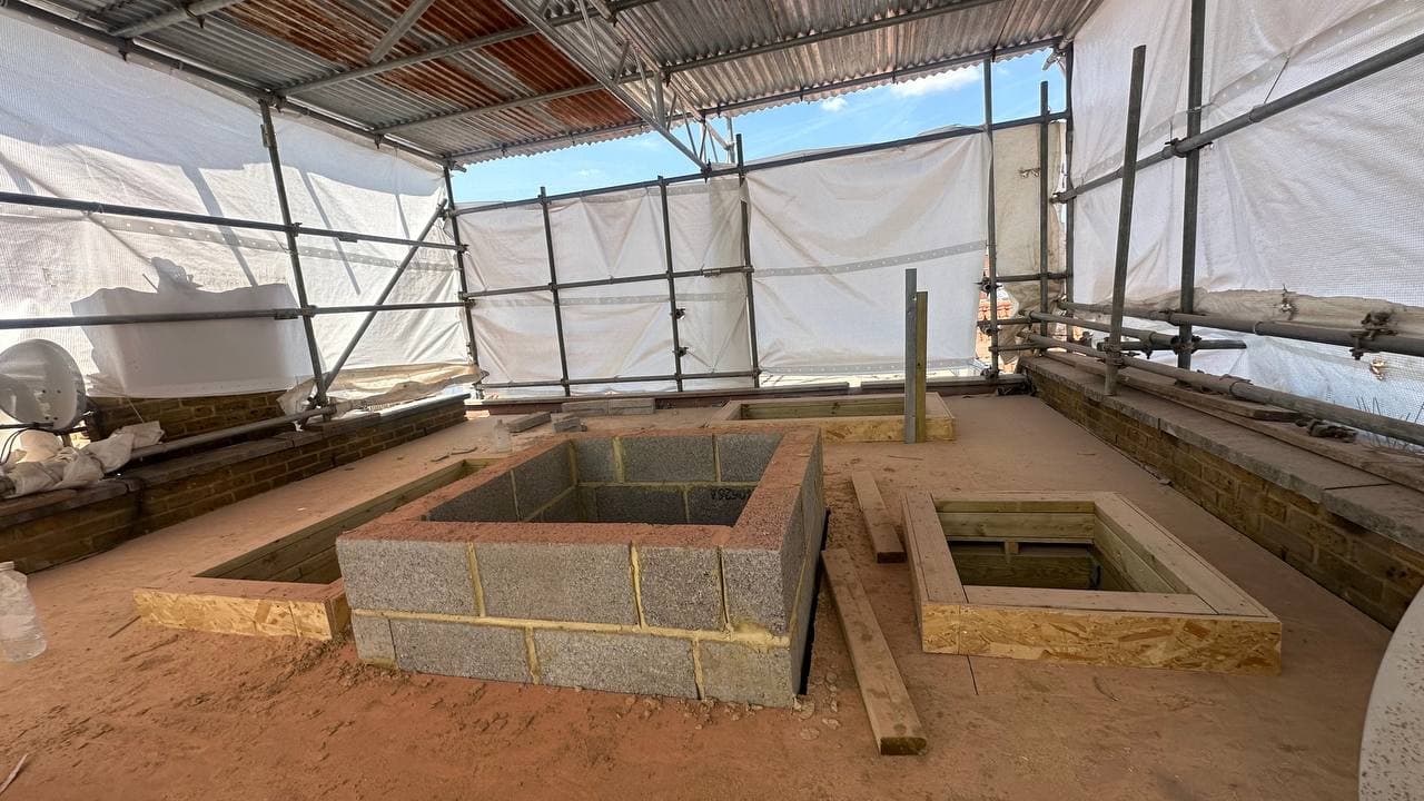 Loft-level roof structure and new masonry shaft