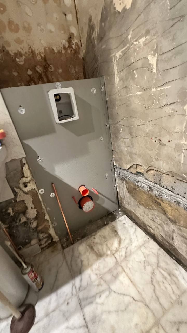 Concealed cistern frame installed with new pipework set out